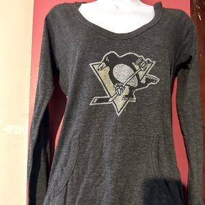 Wright and Ditson size M. Pittsburgh Penguin’s long sleeve tee hooded.